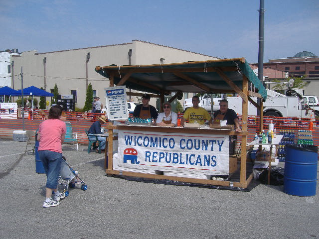 I actually took this picture of the Wicomico County Republican Club food booth just after they opened at 10 a.m. The lady was the first of many satisfied customers.