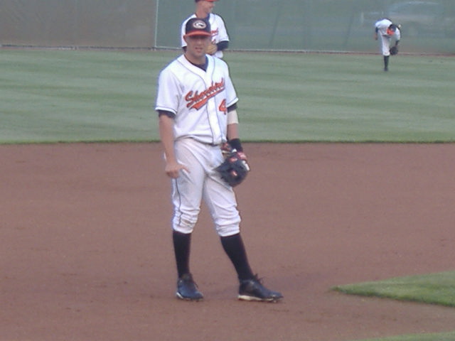 Tyler Henson looks into the Shorebirds dugout from his familiar position, third base.