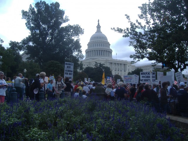 About 11:30 we arrived at the Capitol for the main protest. I thought this was a pretty shot with the flowers and the Capitol dome in the background.