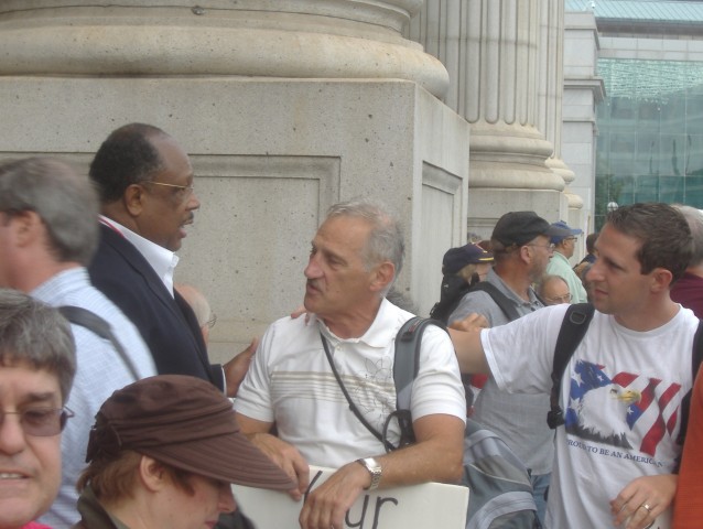 The Rev. James David Manning (left) found a lot of supporters at the protest for his point of view. I wouldn't quite go so far as he does but certainly the frustration with President Obama is real.